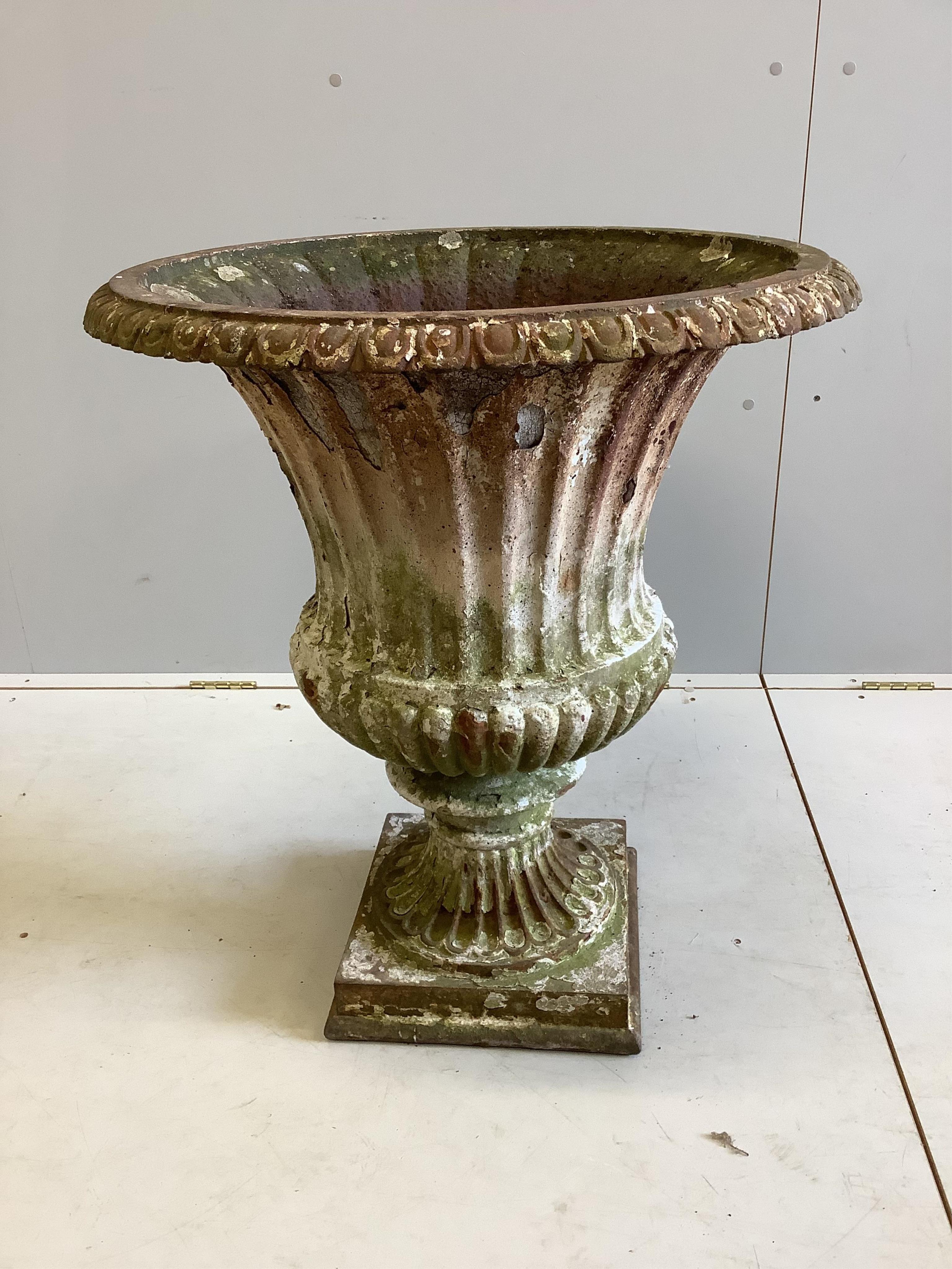 A Victorian painted cast iron campana garden urn, diameter 66cm, height 77cm. Condition - fair
